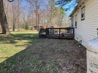 view of yard featuring a deck