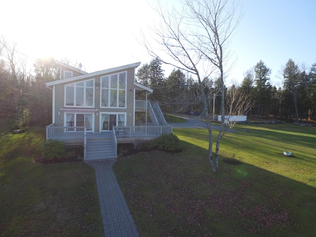 exterior space with a sunroom and a front lawn