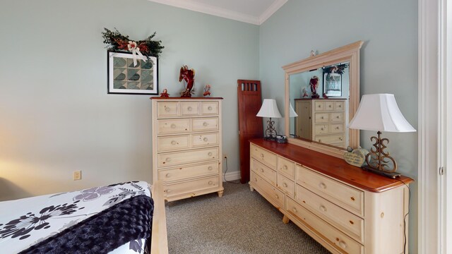 bedroom featuring dark colored carpet and crown molding