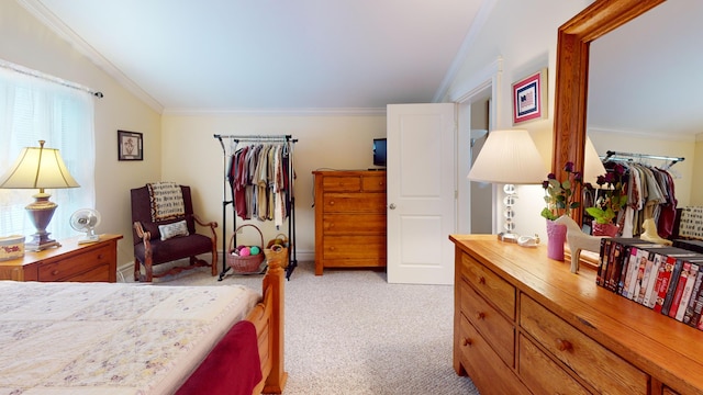 bedroom with lofted ceiling, light carpet, and crown molding