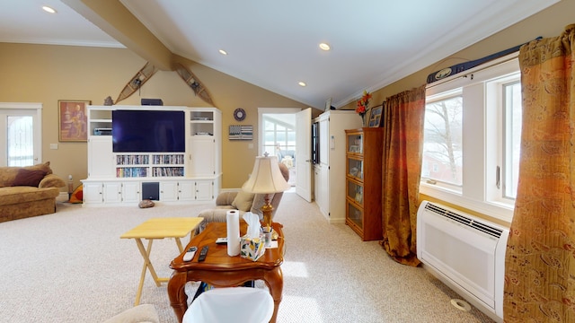 living area featuring a wealth of natural light, light carpet, vaulted ceiling, and recessed lighting