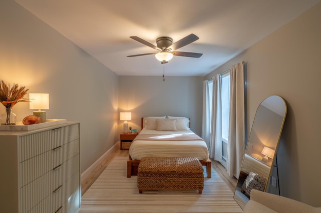 46 Firefly Ln, Bangor, ME 04401 - bedroom with a ceiling fan and light wood-style floors