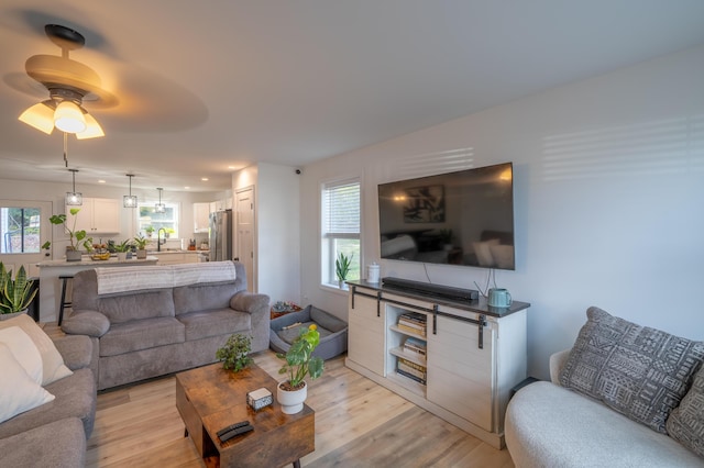 46 Firefly Ln, Bangor, ME 04401 - living area with light wood finished floors and ceiling fan