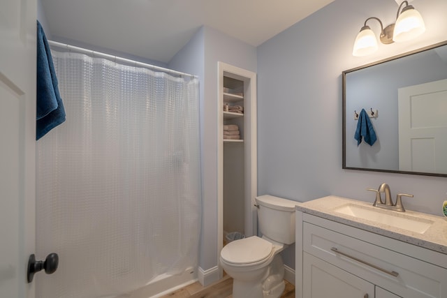 46 Firefly Ln, Bangor, ME 04401 - full bathroom featuring vanity, a shower with curtain, and wood finished floors