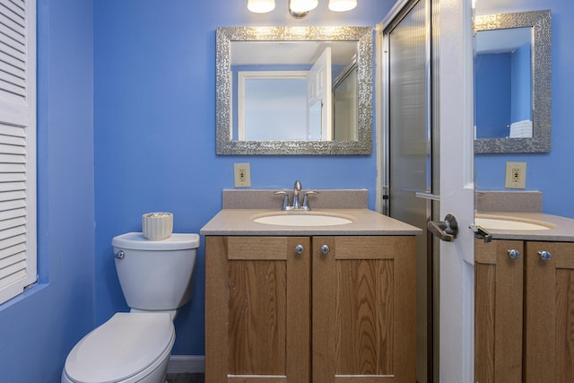 full bathroom featuring toilet and vanity