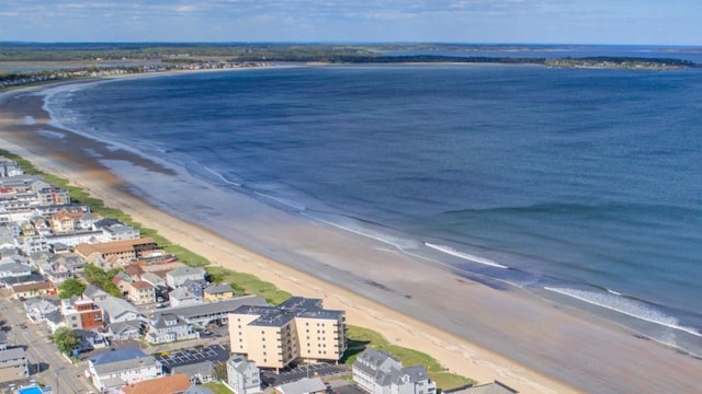 aerial view with a beach view and a water view