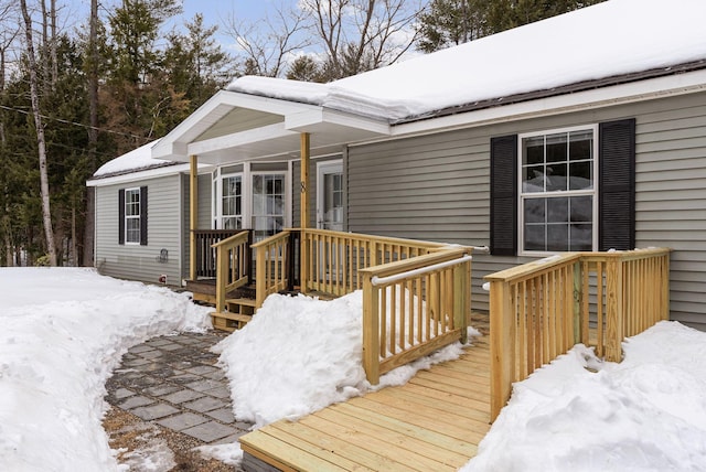 view of snow covered deck