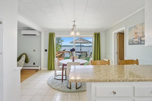 dining space with light tile patterned floors, baseboard heating, a wall unit AC, and crown molding