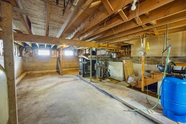 basement featuring a heating unit