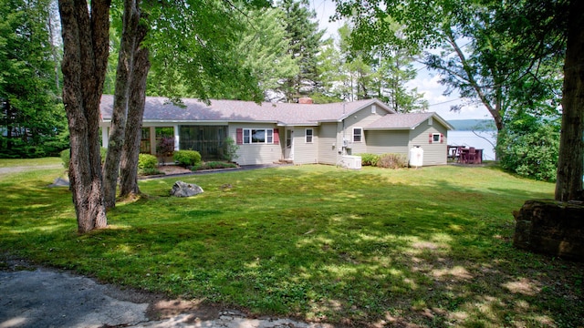 ranch-style home with a front yard