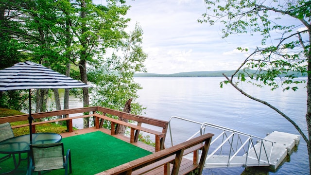 view of dock with a water view