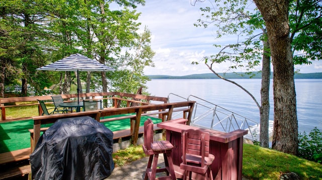 view of dock with a water view