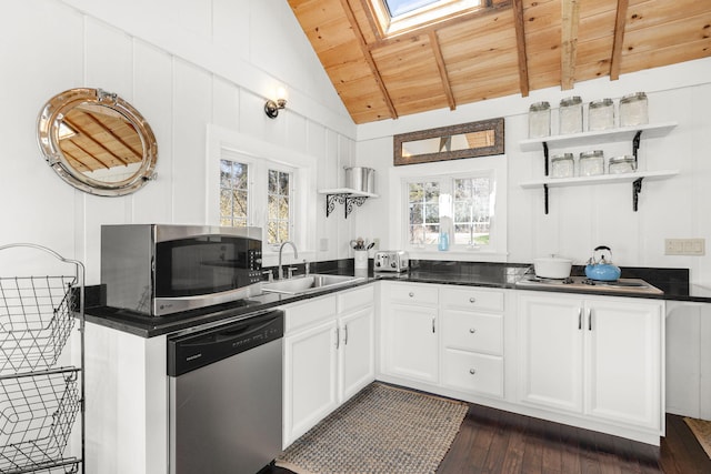 kitchen with stainless steel appliances, a sink, wood ceiling, open shelves, and dark countertops