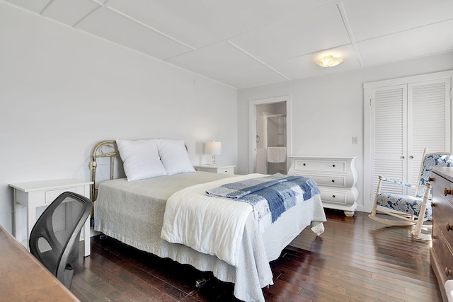 bedroom featuring dark wood-style floors