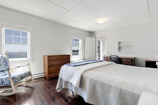 bedroom featuring dark wood-style floors