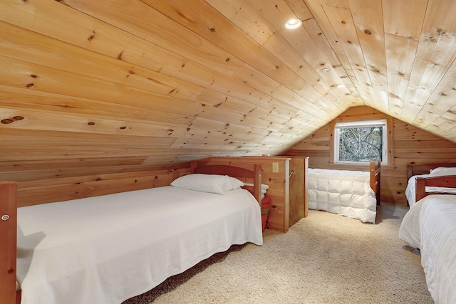 carpeted bedroom with lofted ceiling, wood walls, and wood ceiling