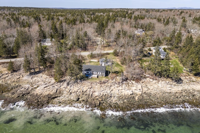 aerial view featuring a view of trees