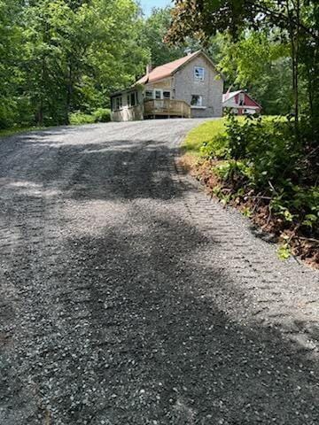 51 N Guilford Rd, Monson, ME 04464 - view of front of property with a view of trees and driveway