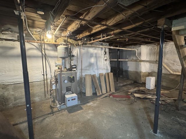 51 N Guilford Rd, Monson, ME 04464 - unfinished basement with a heating unit