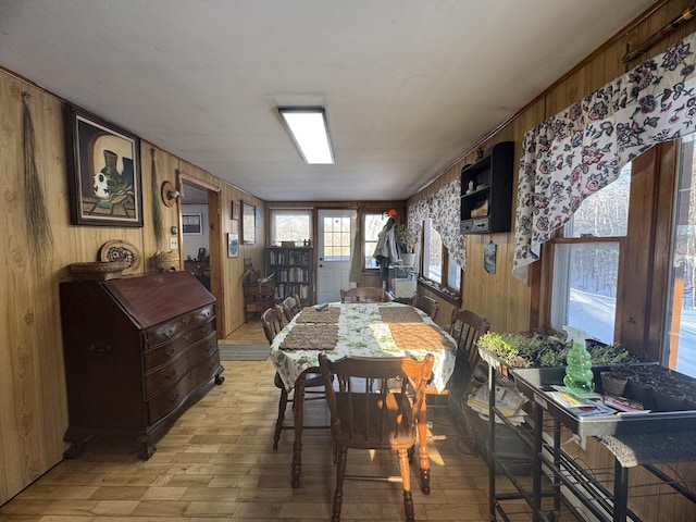 51 N Guilford Rd, Monson, ME 04464 - dining area with wooden walls and light wood finished floors