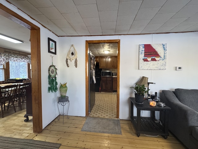 51 N Guilford Rd, Monson, ME 04464 - hallway featuring light wood-type flooring