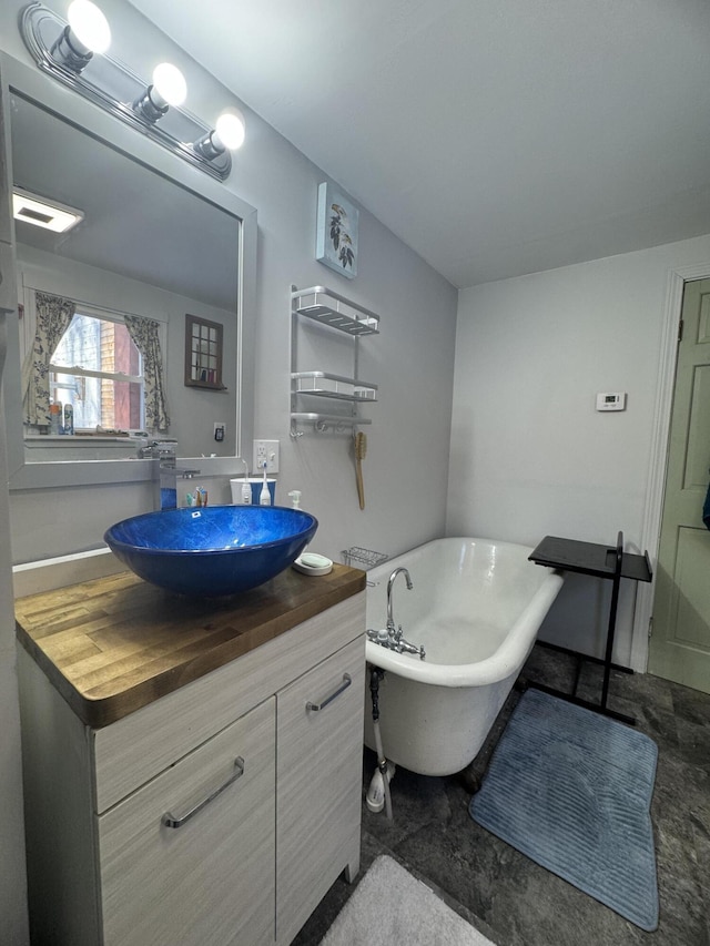 51 N Guilford Rd, Monson, ME 04464 - full bath with vanity and a freestanding tub