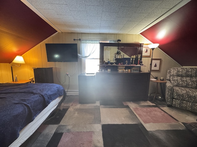 51 N Guilford Rd, Monson, ME 04464 - carpeted bedroom with vaulted ceiling and wooden walls