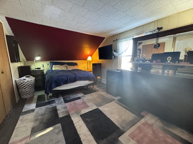 51 N Guilford Rd, Monson, ME 04464 - bedroom with lofted ceiling and wood walls