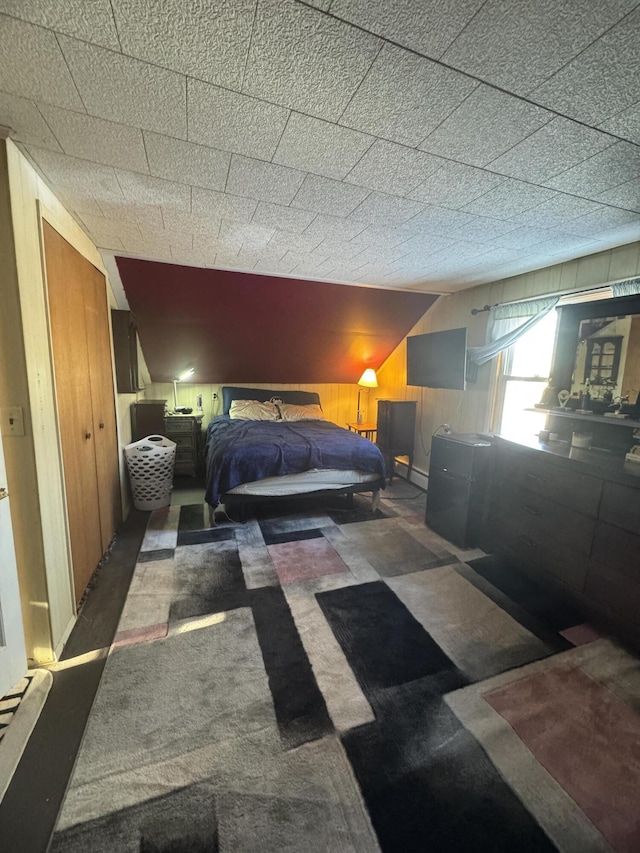 51 N Guilford Rd, Monson, ME 04464 - carpeted bedroom with wood walls