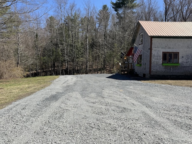 51 N Guilford Rd, Monson, ME 04464 - view of dirt / gravel road featuring a forest view
