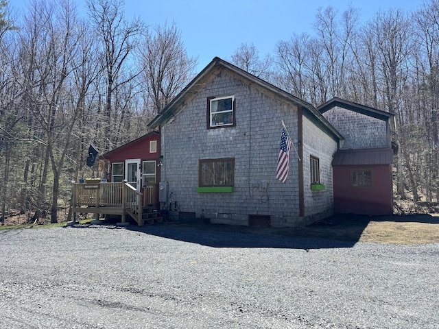 51 N Guilford Rd, Monson, ME 04464 - view of side of home featuring a wooden deck