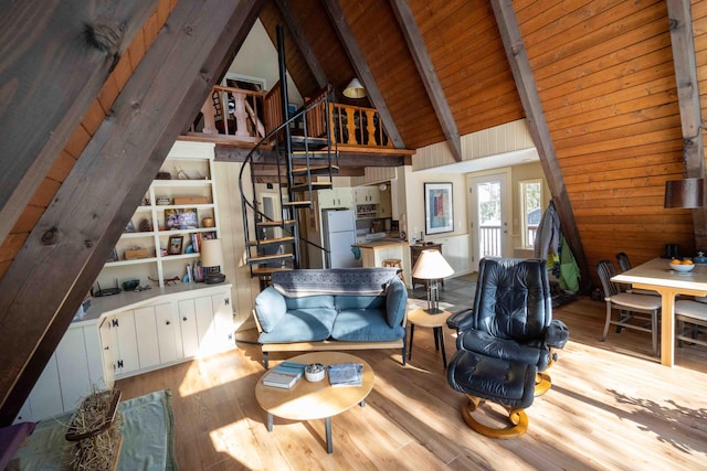 unfurnished living room with wooden ceiling, stairway, wood finished floors, high vaulted ceiling, and beam ceiling