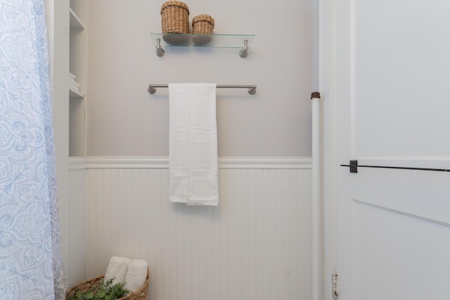 bathroom featuring a wainscoted wall