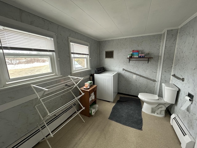 bathroom featuring visible vents, toilet, a baseboard radiator, washer / clothes dryer, and crown molding