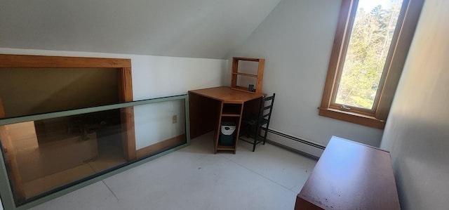 interior space featuring lofted ceiling and baseboard heating