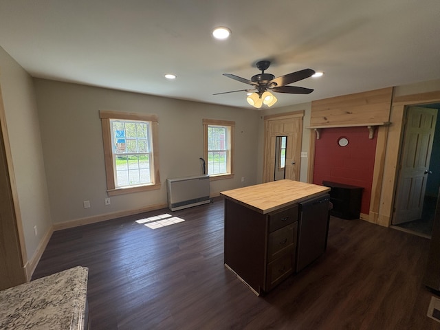 678 Bog Rd, Jackson, ME 04921 - kitchen with wooden counters, dark wood-type flooring, baseboards, ceiling fan, and a kitchen island