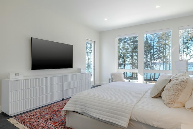 bedroom featuring baseboards and recessed lighting