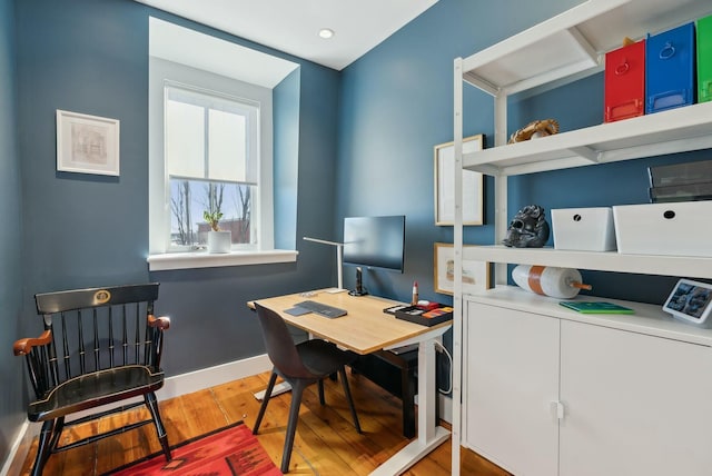 office area featuring wood finished floors and baseboards