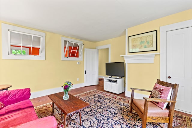 323 Runaround Pond Rd, Durham, ME 04222 - living room featuring wood finished floors and baseboards