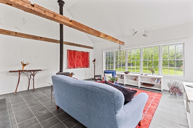 323 Runaround Pond Rd, Durham, ME 04222 - living area with plenty of natural light, dark tile patterned flooring, and high vaulted ceiling