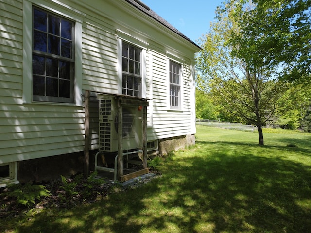 323 Runaround Pond Rd, Durham, ME 04222 - view of grassy yard with ac unit