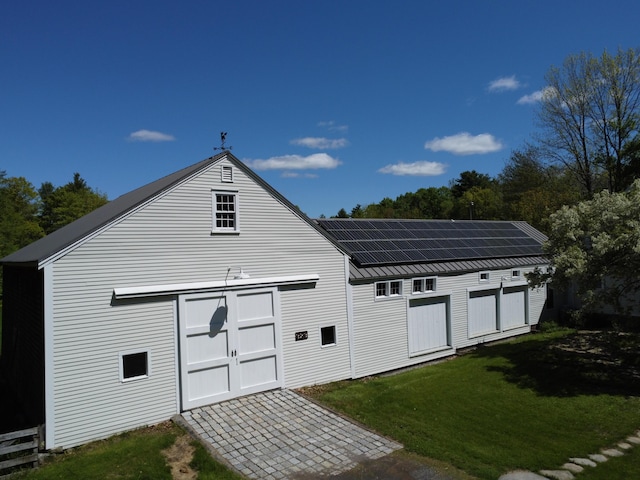 323 Runaround Pond Rd, Durham, ME 04222 - view of outbuilding with solar panels