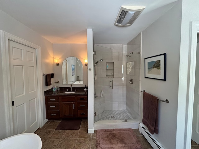 full bathroom with visible vents, a stall shower, tile patterned floors, vanity, and a baseboard radiator