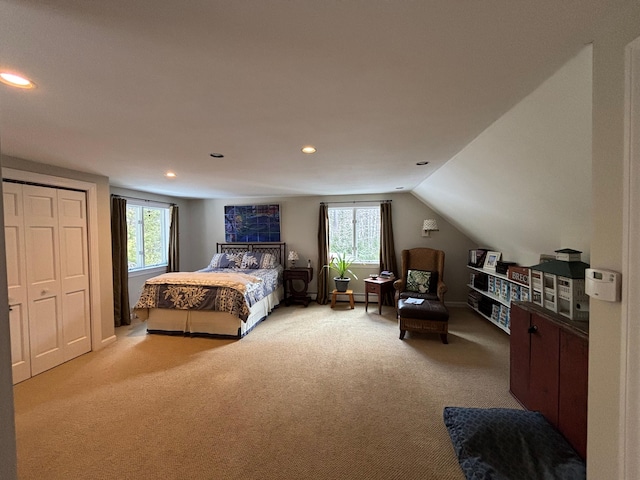 carpeted bedroom featuring lofted ceiling and recessed lighting