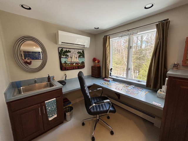 home office with recessed lighting, a baseboard radiator, a wall mounted AC, and a sink