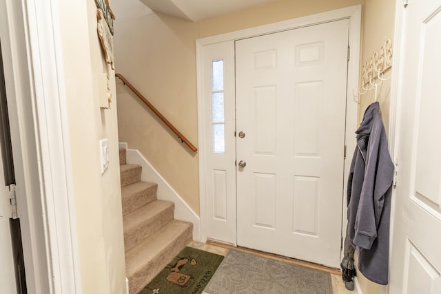 foyer featuring stairway