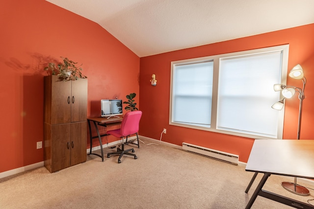 office area with a baseboard heating unit, carpet, vaulted ceiling, and baseboards