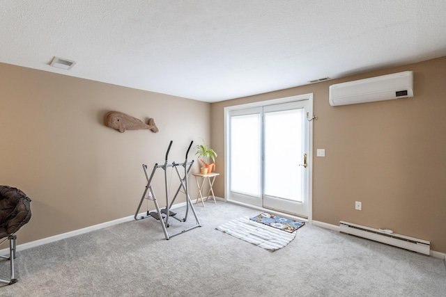 workout area featuring a wall unit AC, carpet, a baseboard radiator, and visible vents