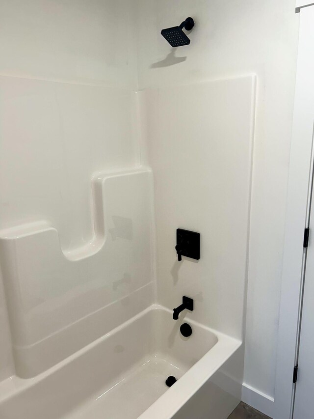 full bath featuring shower / washtub combination