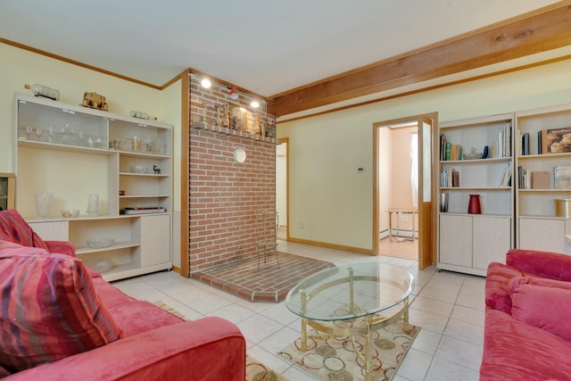 living area with tile patterned flooring, baseboard heating, crown molding, and baseboards